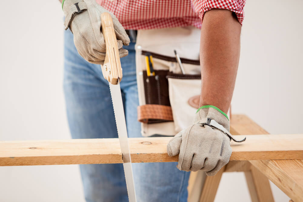 Man using handsaw