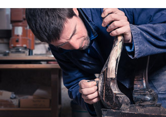 man working on furniture