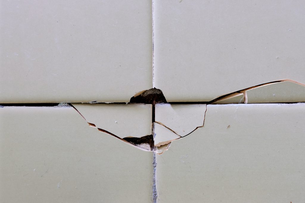 Cracked tile in bathroom